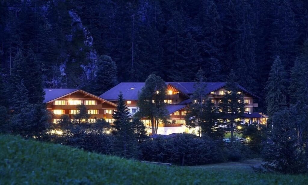 Waldhotel Doldenhorn, known for its tranquil and luxurious setting.