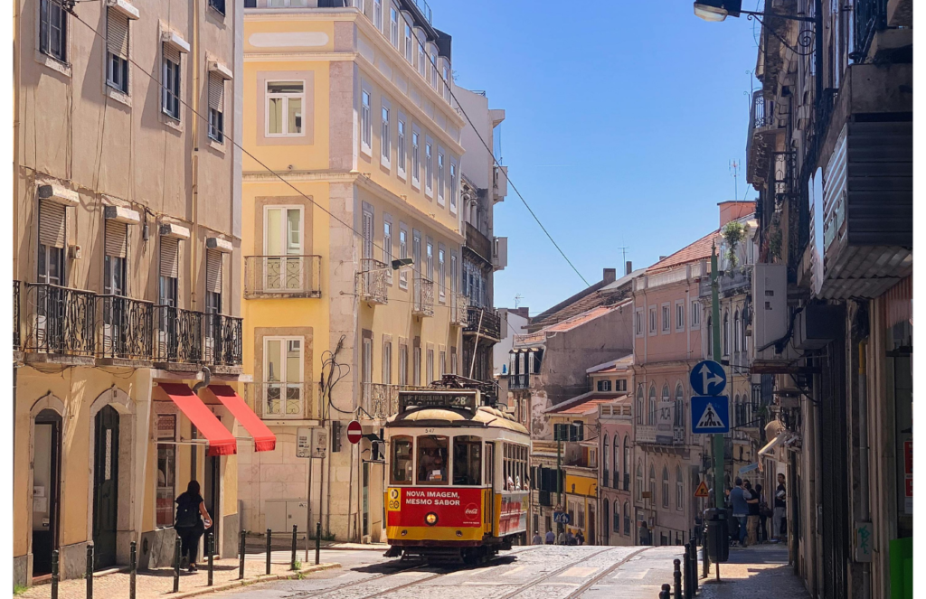 avenidas-novas White And Yellow Train in Lisbon