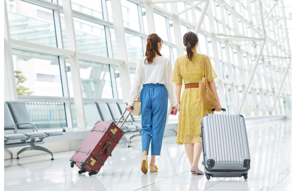 Women Traveling in an Airport