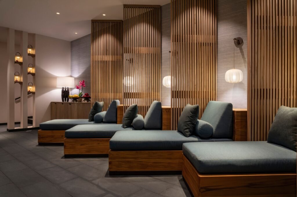 Westin Maui Resort & Spa (Kaanapali)- Modern spa lounge with cushioned daybeds and soft lighting.