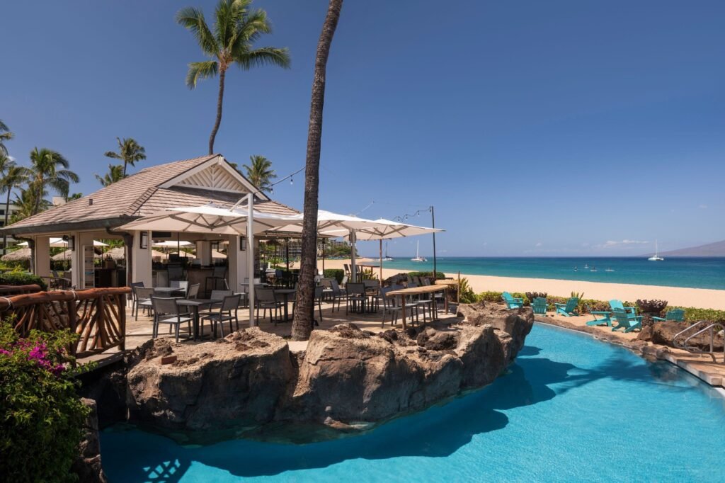 Sheraton Maui Resort & Spa-Beachfront outdoor bar with seating and pool overlooking the ocean.